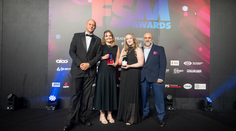 Hayley Clay and Rebecca Croton, from the marketing team, on stage receiving the Campaign of the Year 2025 Award at the FSM Awards.