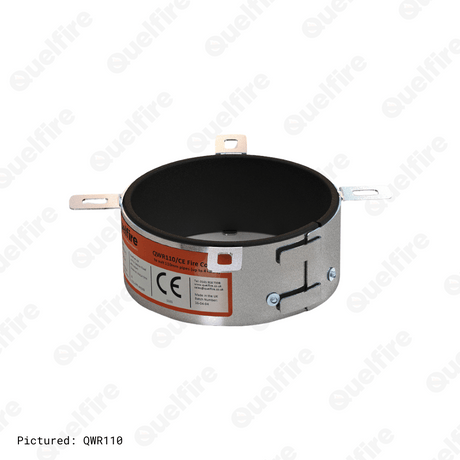 The QWR110 on a white background. The image depicts a circular steel shell with four mounting lugs and an orange and white Quelfire label. Inside the circular opening is a black intumescent material.