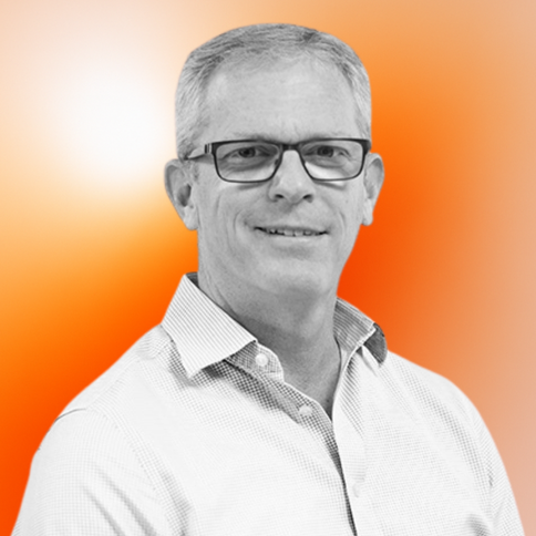 Adrian Paynter, Sales, with a black-and-white filter. The background is an orange gradient. 