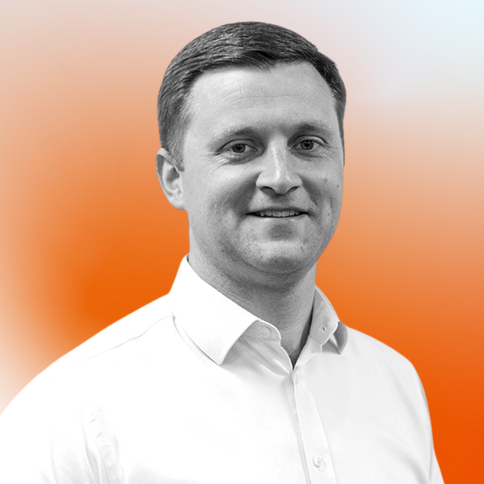 Craig Wells, Sales, with a black-and-white filter. The background is an orange gradient. 