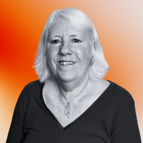 Gill Borrett, Operations Team Leader, with a black-and-white filter. The background is an orange gradient. 