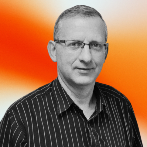 Keith Wells, MD, with a black-and-white filter. The background is an orange gradient. 