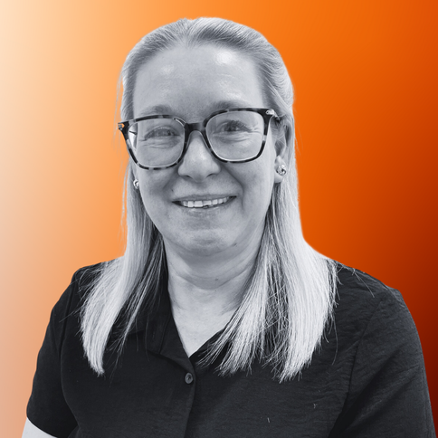 A black-and-white image of Michelle Willians, Accounts, on an orange gradient background. 