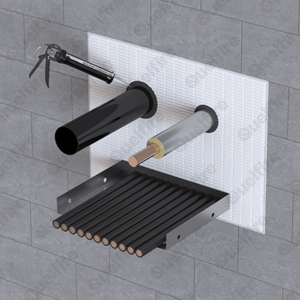 Various pipes (including a cable tray, insulated and plastic pipes) through fire batt in a wall. A sealant gun is applying sealant around the plastic pipe.