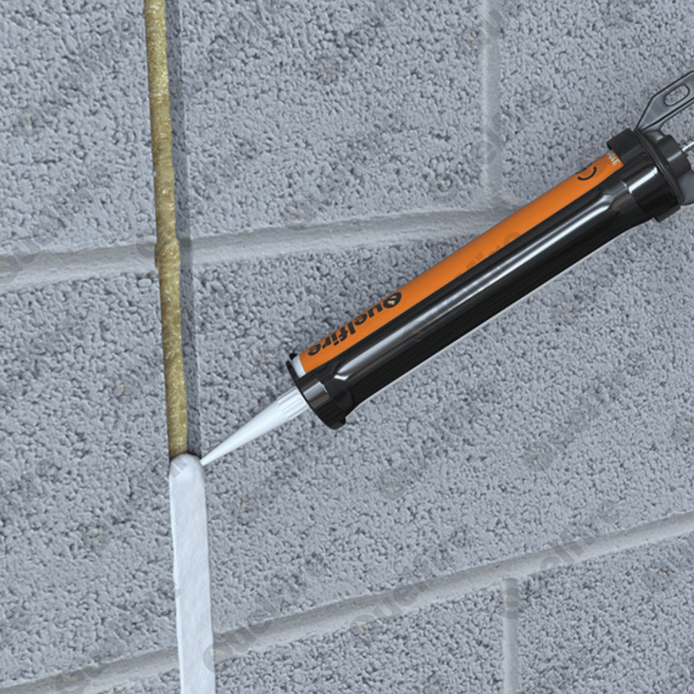 QuelStop QSS Intumescent Acoustic Acrylic Sealant being applied in a block wall.
