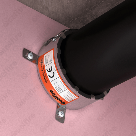 A Quelfire fire collar installed around a plastic pipe, penetrating a plasterboard fire compartment wall.
