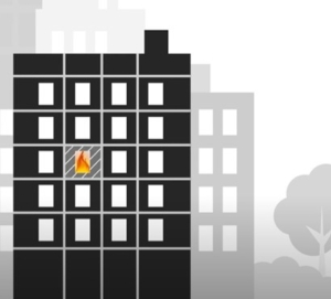 An image depicting a fire trapped within one room of a tower building thanks to effective fire compartmentalisation