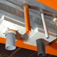 QuelStop Fire Batt installed as a pattress on a steel profiled deck