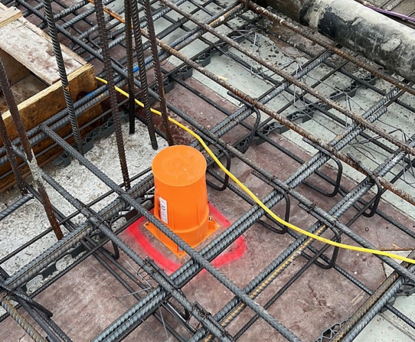 Concrete frame contractors cast in fire collars